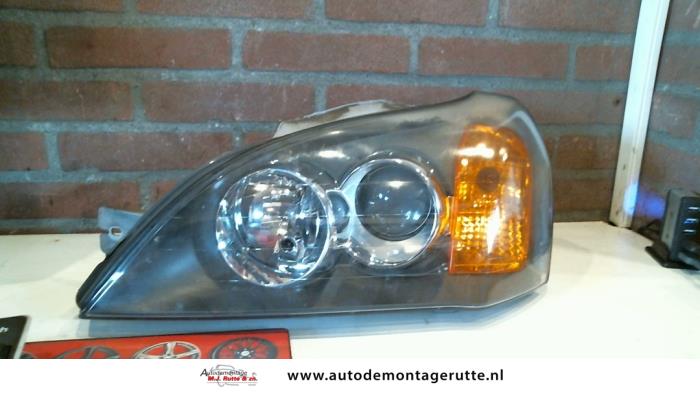 Używane Reflektor lewy Chevrolet Evanda 2.0 16V Cena na żądanie oferowane przez Autodemontage M.J. Rutte B.V.