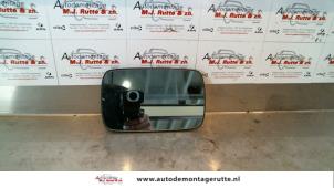 Used Mirror glass, left BMW 3 serie (E36/4) 316i Price on request offered by Autodemontage M.J. Rutte B.V.