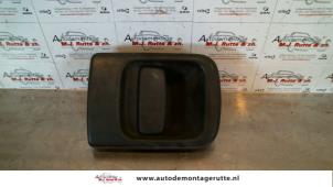 Used Tailgate handle Renault Master III (FD/HD) 2.2 dCi 16V Price on request offered by Autodemontage M.J. Rutte B.V.