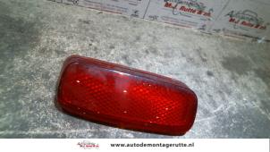 Used Rear bumper reflector, right Peugeot 107 1.0 12V Price on request offered by Autodemontage M.J. Rutte B.V.