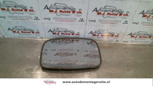 Used Mirror glass, right Ford Fiesta 4 1.3i Price on request offered by Autodemontage M.J. Rutte B.V.