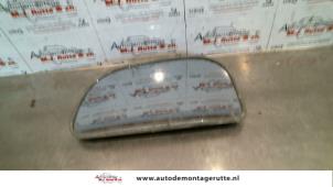 Used Mirror glass, left Mitsubishi Colt (CJ) 1.3 GL,GLX 12V Price on request offered by Autodemontage M.J. Rutte B.V.
