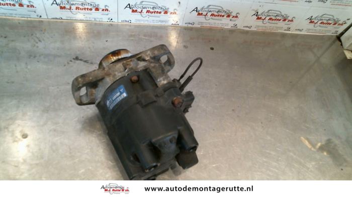 Used Ignition system (complete) Mitsubishi Colt (CJ) 1.3 GL,GLX 12V Price on request offered by Autodemontage M.J. Rutte B.V.