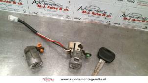 Used Door lock cylinder, right Mitsubishi Colt (CJ) 1.6 GLXi 16V Price on request offered by Autodemontage M.J. Rutte B.V.