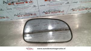 Used Mirror glass, right Toyota Corolla (E10) 1.3 XLi 16V Price on request offered by Autodemontage M.J. Rutte B.V.