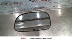 Used Mirror glass, left Toyota Corolla (E10) 1.3 XLi 16V Price on request offered by Autodemontage M.J. Rutte B.V.