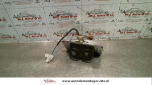 Used Tailgate lock mechanism Mazda 626 (GW19) 1.8i 16V Price on request offered by Autodemontage M.J. Rutte B.V.