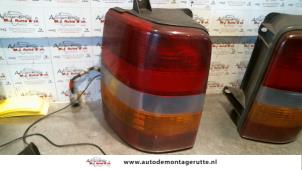 Used Taillight, left Jeep Grand Cherokee (ZJ) 5.2i V8 Price on request offered by Autodemontage M.J. Rutte B.V.