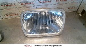 Used Headlight, left Volvo 480 2.0i S Price on request offered by Autodemontage M.J. Rutte B.V.