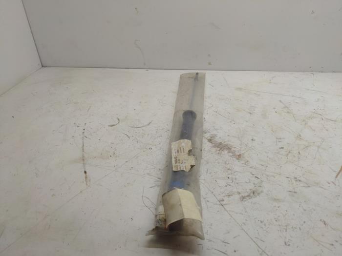 Rear shock absorber, left from a Daihatsu Cuore (L251/271/276) 1.0 12V DVVT 2004