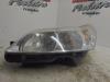 Headlight, left from a Citroën C4 Berline (LC) 1.6 HDi 16V 110 2005