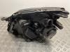 Headlight, right from a Opel Vectra C GTS 2.2 DIG 16V 2004