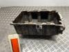 Sump from a Volkswagen Polo IV (9N1/2/3) 1.4 TDI 80 2008