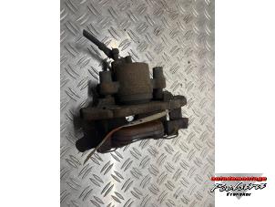 Used Front brake calliper, left Ford Focus 2 Wagon 2.0 TDCi 16V Price on request offered by Autodemontage poelsta B.V.