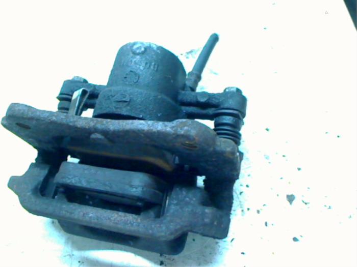 Rear brake calliper, left from a Toyota Avensis Wagon (T25/B1E) 2.0 16V D-4D-F 2008
