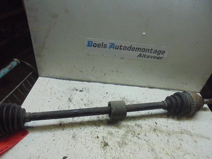 Front drive shaft, left from a Opel Agila 2009