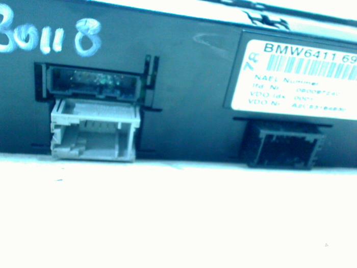 Heater control panel from a BMW 1 serie (E87/87N) 118d 16V 2005