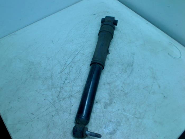 Rear shock absorber, left from a Renault Megane III Grandtour (KZ) 1.5 dCi 110 2013