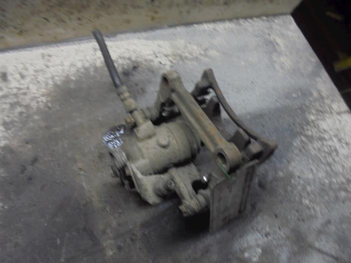 Rear brake calliper, left from a Volkswagen Transporter 2006