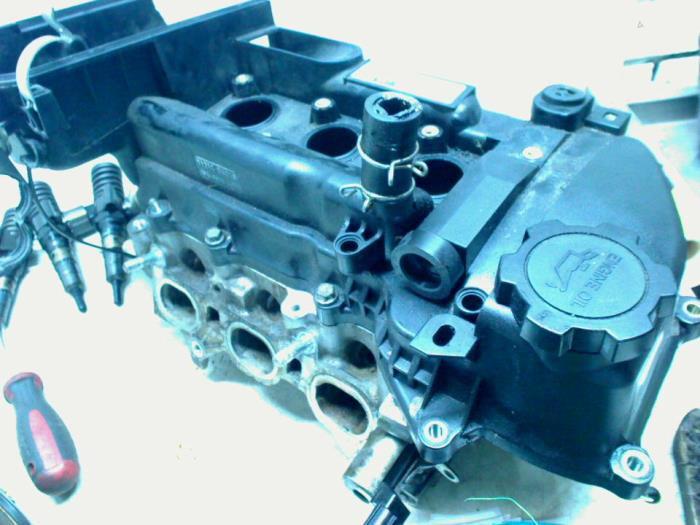 Cylinder head from a Citroën C1 1.0 12V 2007