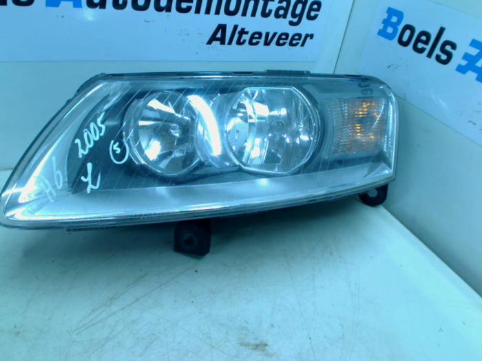 Headlight, left from a Audi A6 Avant (C6) 2.0 TDI 16V 2005