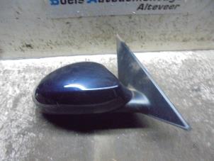 Used Wing mirror, right BMW 1 serie (E81) 120i 16V Price € 40,00 Margin scheme offered by Boels Autodemontage