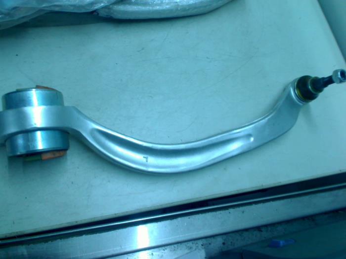 Front lower wishbone, left from a Volkswagen Passat 2003