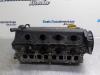 Cylinder head from a Opel Combo (Corsa C) 1.7 DI 16V 2002