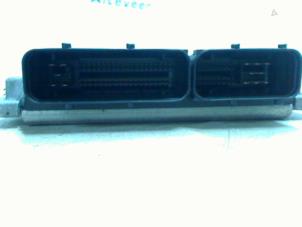 Engine management computer from a Seat Ibiza III (6L1) 1.4 16V 75 2005