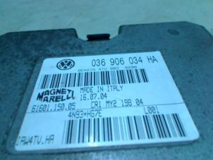 Engine management computer from a Seat Ibiza III (6L1) 1.4 16V 75 2005