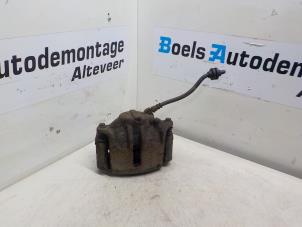 Used Front brake calliper, left Renault Scénic II (JM) 1.6 16V Price on request offered by Boels Autodemontage