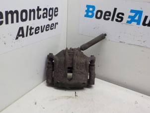 Used Front brake calliper, left Citroen C4 Coupé (LA) 1.4 16V Price € 35,00 Margin scheme offered by Boels Autodemontage