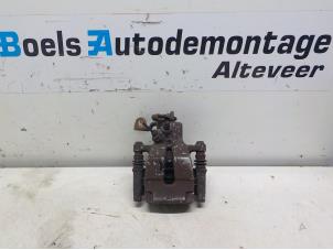 Used Rear brake calliper, left Renault Grand Scénic II (JM) 2.0 16V Price on request offered by Boels Autodemontage