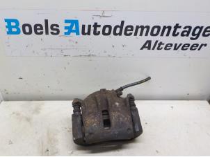Used Front brake calliper, left Renault Grand Scénic II (JM) 2.0 16V Price on request offered by Boels Autodemontage
