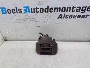 Used Front brake calliper, right Daihatsu Cuore (L251/271/276) Price € 25,00 Margin scheme offered by Boels Autodemontage
