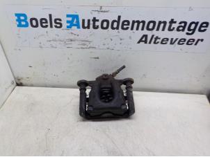 Used Front brake calliper, right BMW 1 serie (E81) 116i 1.6 16V Price € 40,00 Margin scheme offered by Boels Autodemontage