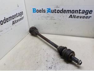 Used Drive shaft, rear right BMW 1 serie (E81) 116i 1.6 16V Price € 50,00 Margin scheme offered by Boels Autodemontage