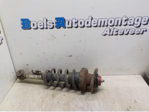 Used Rear shock absorber, right BMW Mini One/Cooper (R50) 1.6 16V Cooper Price € 35,00 Margin scheme offered by Boels Autodemontage