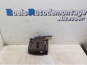 Used Front brake calliper, left Nissan Micra (K13) 1.2 12V Price € 35,00 Margin scheme offered by Boels Autodemontage