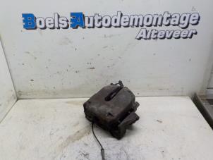 Used Front brake calliper, left BMW 5 serie (E39) 525i 24V Price € 40,00 Margin scheme offered by Boels Autodemontage