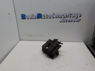Used Front brake calliper, left Nissan Micra (K12) 1.4 16V Price € 35,00 Margin scheme offered by Boels Autodemontage