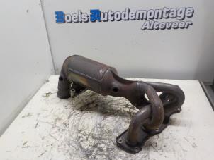 Used Exhaust manifold + catalyst Mini Mini (R56) 1.4 16V One Price € 150,00 Margin scheme offered by Boels Autodemontage