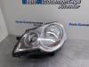 Headlight, left from a Volkswagen Polo IV (9N1/2/3)