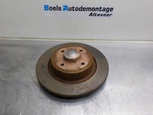 Usagé Disque de frein arrière Renault Scénic I (JA) 1.8 16V Prix sur demande proposé par Boels Autodemontage