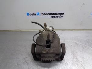 Used Front brake calliper, right BMW 3 serie (E90) 330d 24V Price € 40,00 Margin scheme offered by Boels Autodemontage