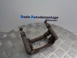 Used Rear brake calliperholder, left Opel Insignia 1.8 16V Ecotec Price € 15,00 Margin scheme offered by Boels Autodemontage