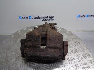 Used Front brake calliper, left Skoda Yeti (5LAC) 2.0 TDI 16V 4x4 Price on request offered by Boels Autodemontage