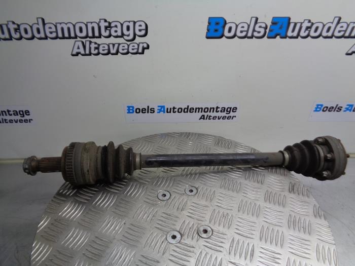 Drive shaft, rear left from a BMW 1 serie (E87/87N) 116i 1.6 16V 2005