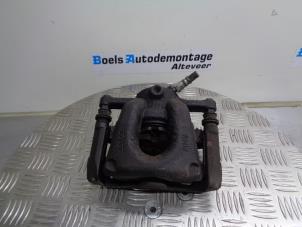 Used Front brake calliper, right BMW 1 serie (E87/87N) 116i 1.6 16V Price € 40,00 Margin scheme offered by Boels Autodemontage