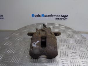 Used Front brake calliper, right Renault Clio III (BR/CR) 1.2 16V 75 Price on request offered by Boels Autodemontage